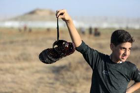 Palestinians Demonstrate Along The Israel-Gaza Border