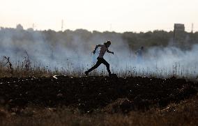 Palestinians Demonstrate Along The Israel-Gaza Border