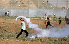 Palestinians Demonstrate Along The Israel-Gaza Border