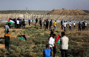 Palestinians Demonstrate Along The Israel-Gaza Border