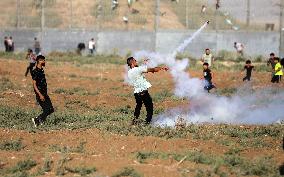 Palestinians Demonstrate Along The Israel-Gaza Border