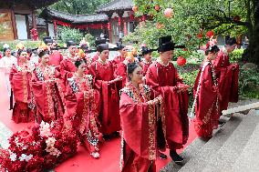 #CHINA-QIXI FESTIVAL-GROUP WEDDING (CN)