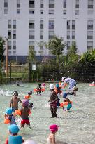 Children Swim In A Natural Pond - Pantin