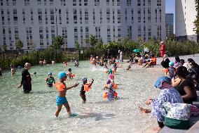 Children Swim In A Natural Pond - Pantin