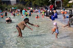 Children Swim In A Natural Pond - Pantin