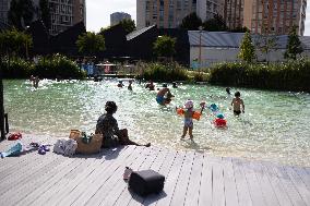 Children Swim In A Natural Pond - Pantin