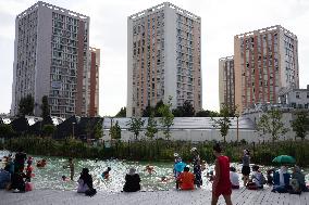 Children Swim In A Natural Pond - Pantin