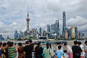Tourists Enjoy The Bund Scenic Area in Shanghai