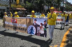 Members Of The Falun Gong Protest Against The Communist Party Of China