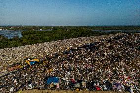Indonesia's Waste Crisis At Suwung Landfill, Bali Island.