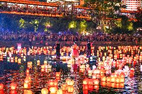 People Float Lanterns in the Zijiang River in Guilin