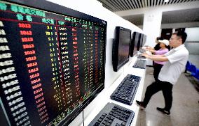 China Stock Market Stamp Duty Halved