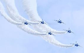 Blue Impulse aerobatic team flies over northeastern Japan