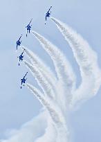 Blue Impulse aerobatic team flies over northeastern Japan