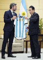 Japan PM Kishida receives Argentine football jersey