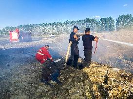 Extinguishing Burning Garbage Dump in Altay