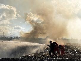 Extinguishing Burning Garbage Dump in Altay