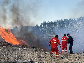 Extinguishing Burning Garbage Dump in Altay