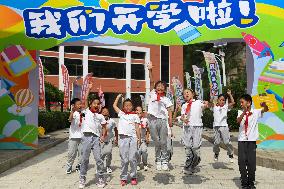 Xinhua Headlines: New school semester kicks off in China's flood-ravaged regions
