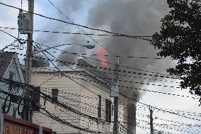 Two-Alarm Fire Engulfs Home In Newark, New Jersey