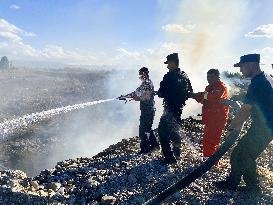 Extinguishing Burning Garbage Dump in Altay
