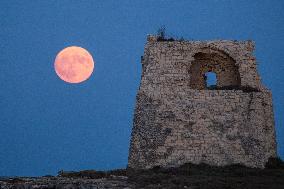 'Blue Supermoon' Rises In The Tower Of Roca Vecchia