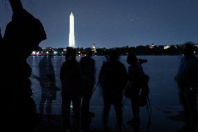 Blue supermoon rises behind Jefferson Memorial in Washington, DC