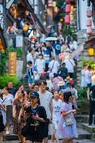 Tourists Visit Ciqikou Ancient Town in Chongqing