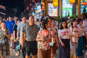 Tourists Visit Ciqikou Ancient Town in Chongqing