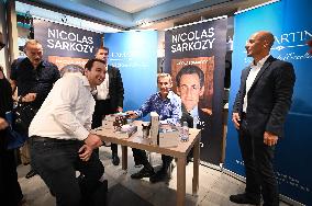 Nicolas Sarkozy Signs His Book - Paris