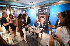 Nicolas Sarkozy Signs His Book - Paris