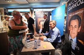 Nicolas Sarkozy Signs His Book - Paris
