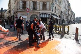 Climate Activists Sprays Orange Paint On Place Beauvau - Paris