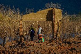 Due To The Extremely Dry Weather, The Moragahakanda Reservoir Has Dried Up, And The Old Ruins Have Been Exposed.