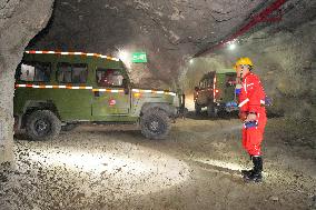 Workers Work at A Mining Face at The Sanshandao Gold Mine in Laizhou