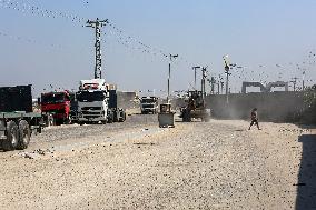 Palestinian Trucks In Front Of The Kerem Shalom Commercial Crossing, In Gaza Strip