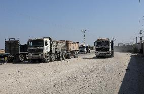 Palestinian Trucks In Front Of The Kerem Shalom Commercial Crossing, In Gaza Strip