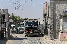 Palestinian Trucks In Front Of The Kerem Shalom Commercial Crossing, In Gaza Strip