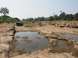 Drought-Induced Low Water Levels In Cisadane River, Tangerang