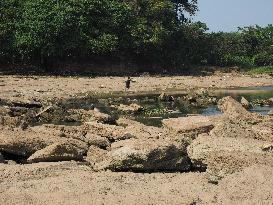 Drought-Induced Low Water Levels In Cisadane River, Tangerang