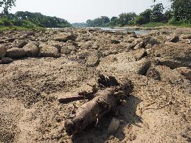 Drought-Induced Low Water Levels In Cisadane River, Tangerang