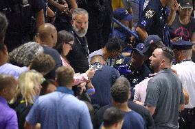 US Open - Climate Protesters Halt Women's Semi-Final