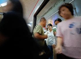 Passengers at Subway Station in Beijing