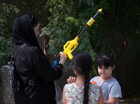 Iran-Water Gun Festival In Tehran