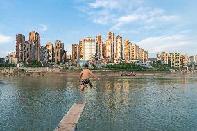 People Dive Along The Yangtze River in Chongqing