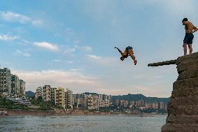 People Dive Along The Yangtze River in Chongqing