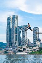 People Dive Along The Yangtze River in Chongqing