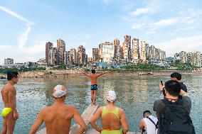 People Dive Along The Yangtze River in Chongqing