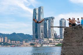 People Dive Along The Yangtze River in Chongqing