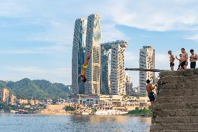 People Dive Along The Yangtze River in Chongqing